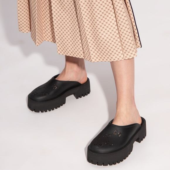 Gucci Perforated G Platform Mules in Black Rubber - Picture 1 of 13